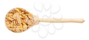 top view of wood spoon with sugar coated cornflakes isolated on white background