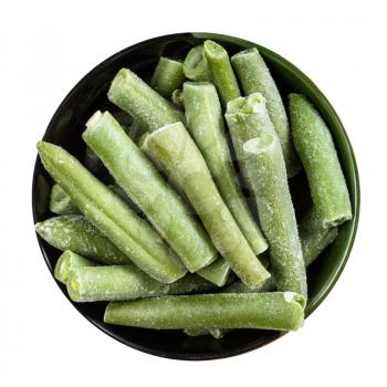 top view of cut and frozen green beans in round bowl isolated on white background