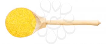 top view of wood spoon with uncooked polenta fine cornmeal isolated on white background