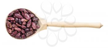top view of wood spoon with red spotted pinto beans isolated on white background