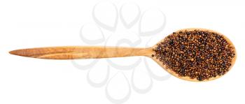 top view of wood spoon with canihua grains isolated on white background