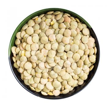 top view of raw whole light green lentils in round bowl isolated on white background