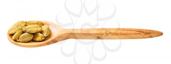 wooden spoon with cardamom seeds isolated on white background