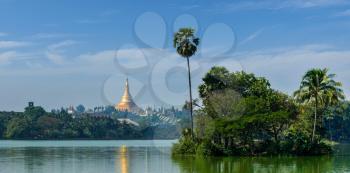 Panorama of  Shwedagon Pagoda over Kandawgyi Lake in Yangon, Burma Myanmar