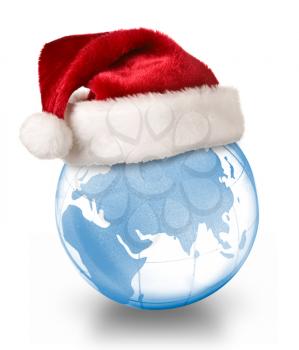 Christmas planet concept - Santa hat on crystal glass globe isolated on white background