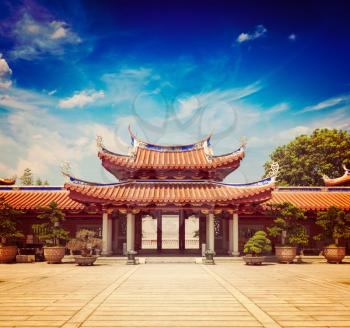 Vintage retro effect filtered hipster style travel image of gates of Lian Shan Shuang Lin Monastery, Singapore