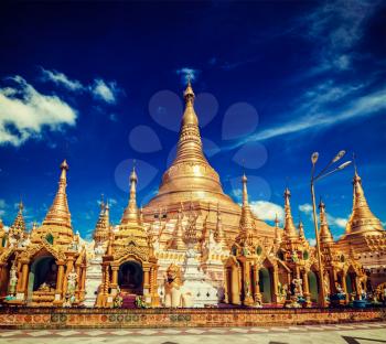 Vintage retro effect filtered hipster style image of Myanmer famous sacred place and tourist attraction landmark - Shwedagon Paya pagoda. Yangon, Myanmar