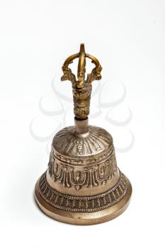 Tibetan buddhist ceremonial religious bell isolated on white