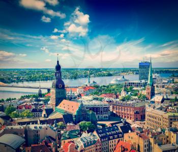 Vintage retro hipster style travel image of aerial view of Riga center from St. Peter's Church, Riga, Latvia