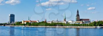 Panorama of Riga over Daugava river: Riga Castle, St. James's Cathedral, Riga Cathedral, St. Peter's Church