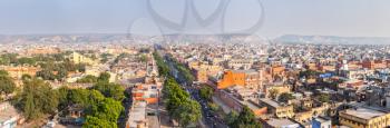 Panorama of aerial view of Jaipur  (Pink city) - Hawa Mahal (Palace of Winds or âPalace of the Breezeâ) and Jantar Mantar observatory. Jaipur, Rajasthan, India