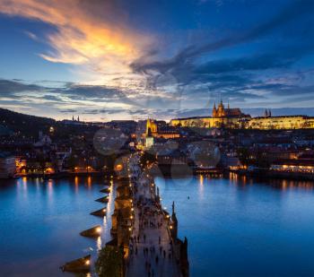 Night aerial view of Prague castle and Charles Bridge over Vltava river in Prague, Czech Republic. Prague, Czech Republic
