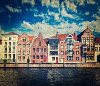 Vintage retro hipster style travel image of canal and medieval houses. Bruges (Brugge), Belgium