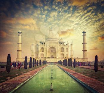 Taj Mahal on sunrise sunset, Indian Symbol - India travel background. Agra, Uttar Pradesh, India. Retro vintage hipster style cross processed