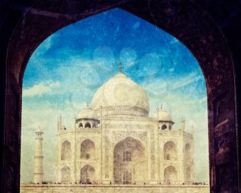 Vintage retro hipster style travel image of Taj Mahal through arch, Indian Symbol - India travel background. Agra, Uttar Pradesh, India with grunge texture overlaid