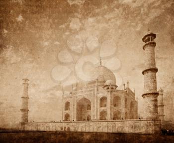 Taj Mahal Indian Symbol - India travel background  with grunge texture overlaid. Agra, India