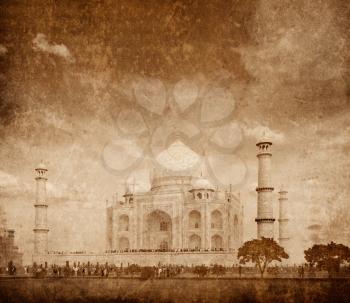 Taj Mahal. Indian Symbol - India travel background with grunge texture overlaid. Agra, India