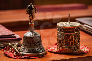 Tibetan Buddhist still life - vajra, bell and prayer wheel. Hemis gompa, Ladakh, India.