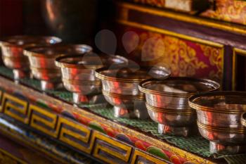Offerings (Tibetan Water Offering Bowls) in Lamayuru gompa (Tibetan Buddhist monastery). Ladadkh, India