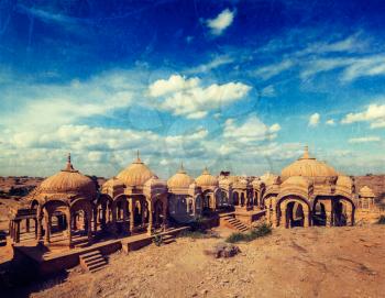 Vintage retro hipster style travel image of Bada Bagh cenotaphs ruins, Jodhpur, Rajasthan, India with grunge texture overlaid