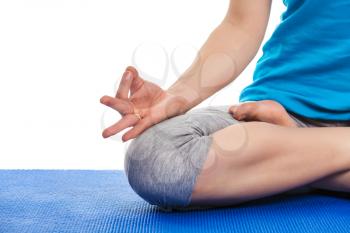 Close up of yoga Padmasana (Lotus pose) cross legged position for meditation with Chin Mudra - psychic gesture of consciousness