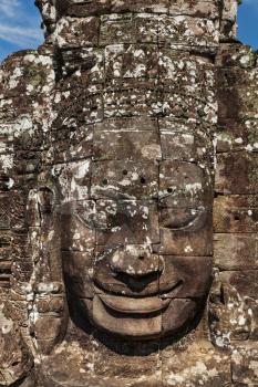 Ancient stone face of Bayon temple, Angkor, Cambodia