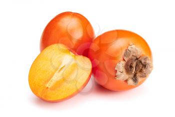 Fresh ripe orange persimmon and slice isolated on white background