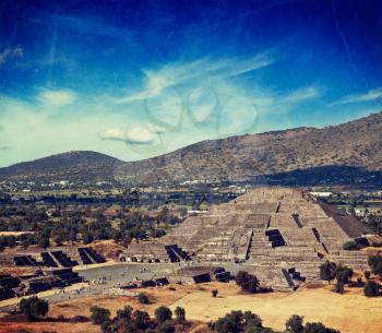 Vintage retro hipster style travel image of famous Mexico landmark tourist attraction - Pyramid of the Moon, view from the Pyramid of the Sun. Teotihuacan, Mexico with grunge texture overlaid