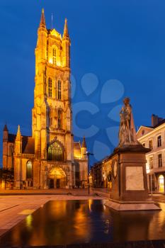Monument to Jan Frans Willems and Saint Bavo Cathedral in the evening. Sint-Baafsplein, Flanders, Ghent, Belgium