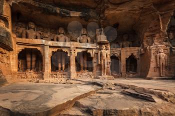 Rockcut Statues of Jain thirthankaras in rock niches near Gwalior fort. Gwalior, Madhya Pradesh, India