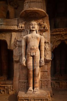 Rockcut Statue of Jain thirthankara in rock niches near Gwalior fort. Gwalior, Madhya Pradesh, India