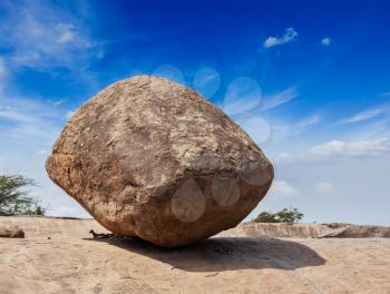 Krishna's butterball -  balancing giant natural rock stone. Mahabalipuram, Tamil Nadu, India