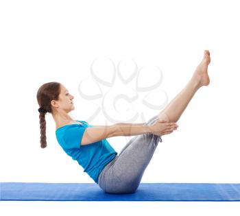 Yoga - young beautiful woman yoga instructor doing Full Boat pose asana (Paripurna navasana) exercise isolated on white background