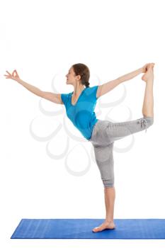 Yoga - young beautiful slender woman yoga instructor doing Lord of the Dance Pose (Natarajasana) asana exercise isolated on white background