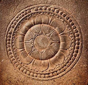 Stylized lotus carved on stone