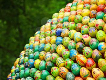 A lot of multicolored easter eggs taken closeup.