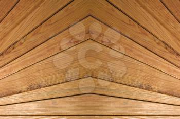 Abstract symmetrical wooden slats background.