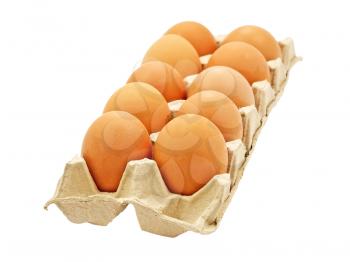 Dozen of fresh eggs in a pot isolated on white background.