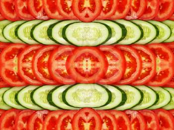 Slices of tomatoes and cucumbers suitable as symmetrical background.