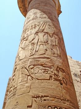 Ancient Column in the Karnak temple with ancient images.                              