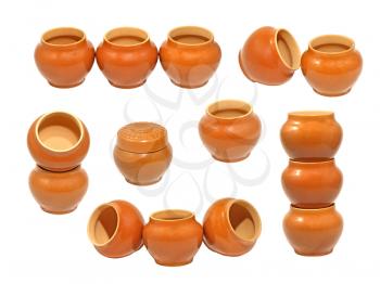 Set of clay pots isolated on a white background.
