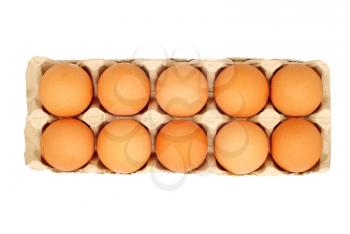 Dozen eggs in a pot isolated on white background.