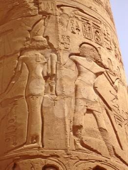 Ancient Column in the Karnak temple with ancient images.