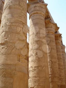 Ancient Columns in the Karnak temple with ancient images.

