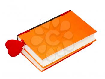 The love novel  with  red heart  as a bookmark isolated on a white background.