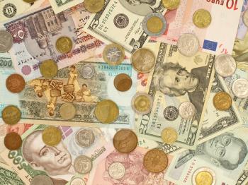 Banknotes and coins of different countries.Background.