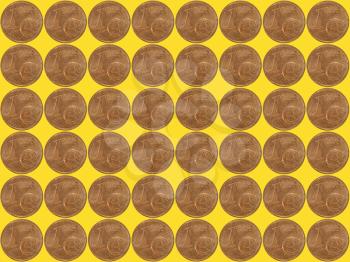 One euro cent coins collage on yellow background.
