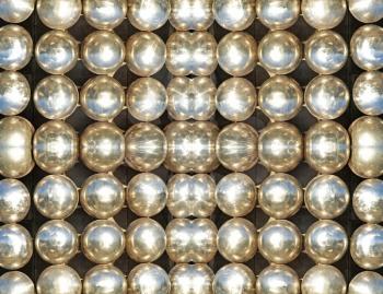 Shining metallic balls suitable as symmetrical abstract background.