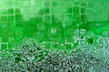 Abstract background with green transparent cube shape.Digitally generated image.