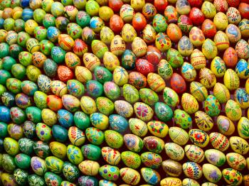Multicolored easter eggs taken closeup as background.